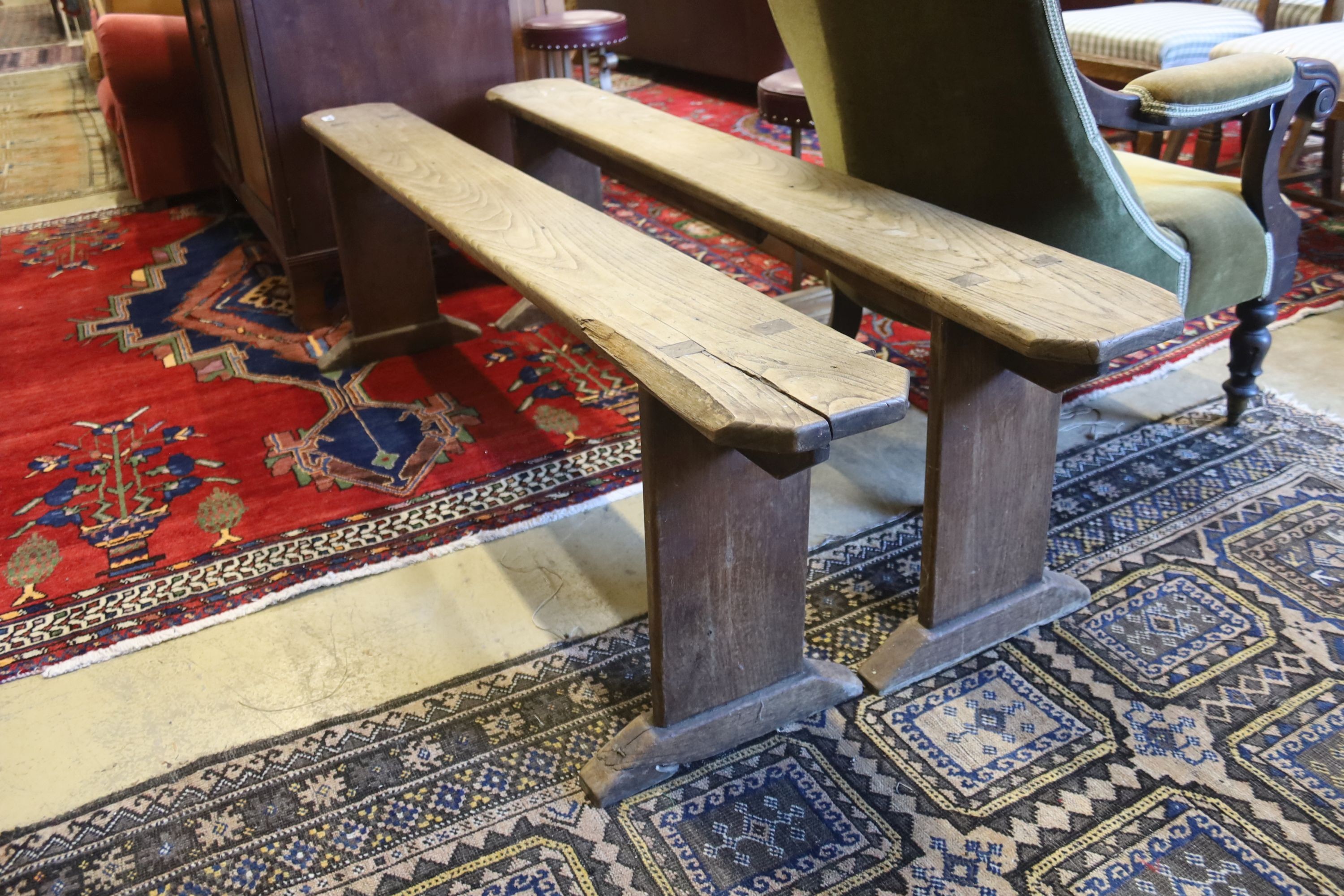 A pair of 19th century provincial elm benches, length 161cm, depth 18cm, height 46cm